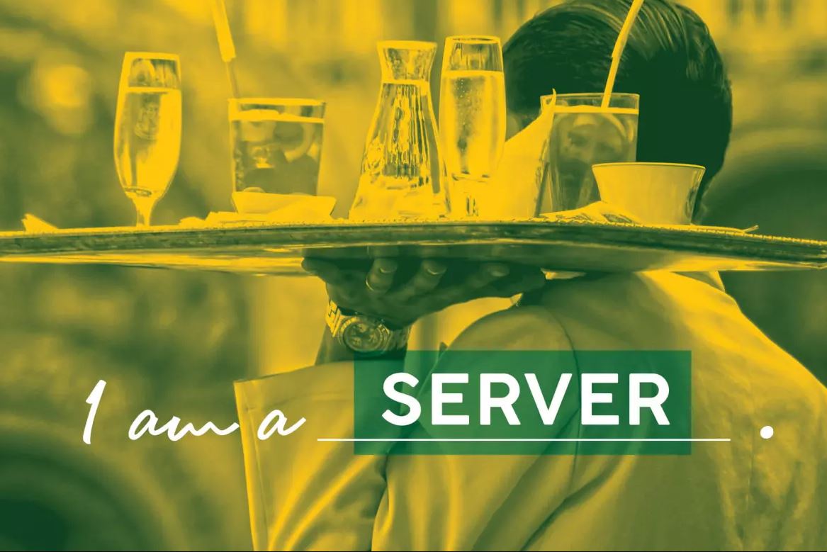A server holds an array of drinks on a tray with one hand. In front of the image is a caption that states "I am a server"