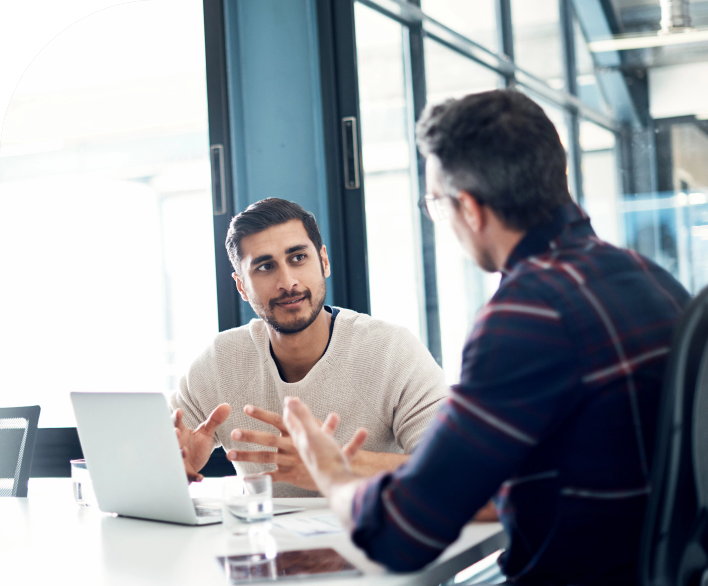 Personal Service, Workplace Safety, a great Medical Provider Network, and Financial Security are all great reasons to choose Preferred. A client and an agent engage in a meeting at a cafe